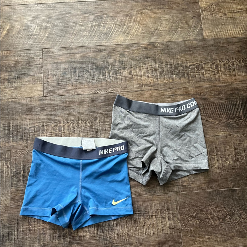 2 pairs of nike pro spandex